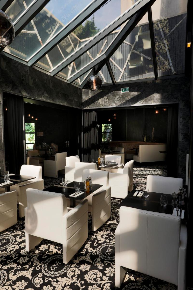 Coin salon dans l'établissement Le Grand Hôtel Le Touquet-Paris-Plage