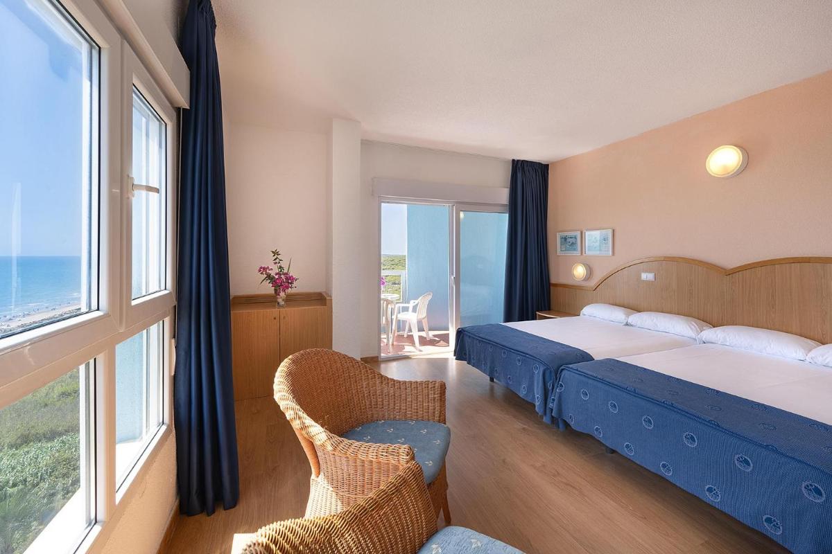 Cama o camas de una habitación en Hotel Playas de Guardamar