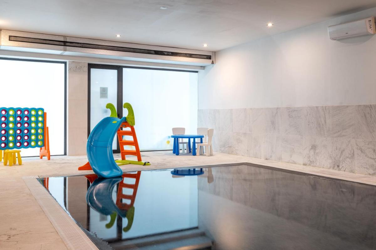 O clube infantil de Hotel Porta do Sol Conference & SPA