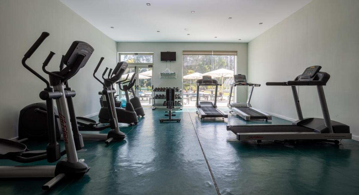 O centro de fitness e/ou as comodidades de fitness de Hotel Porta do Sol Conference & SPA