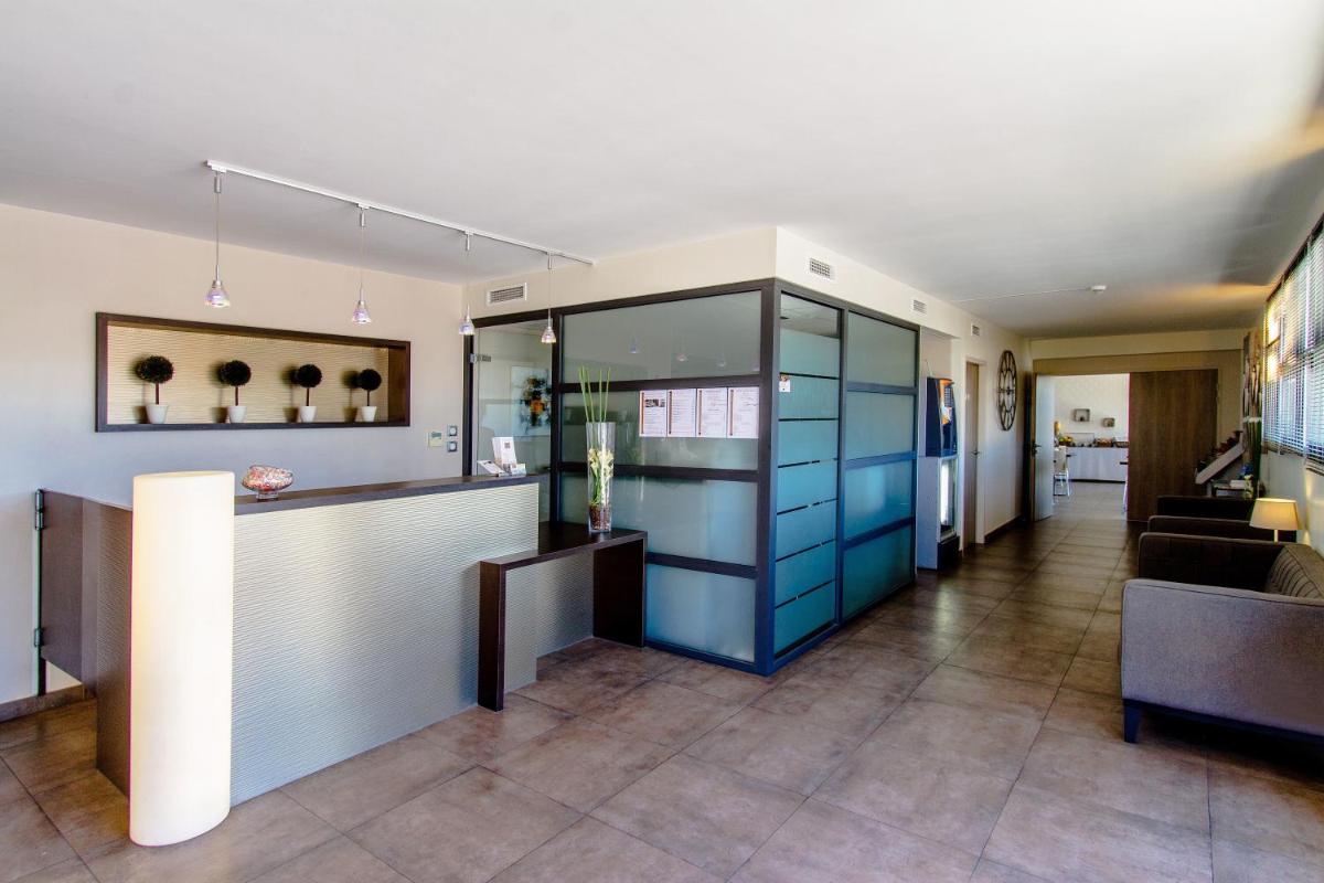 Cuisine ou kitchenette dans l'établissement Forme-hotel & Spa Montpellier Sud-Est - Parc Expositions - Arena