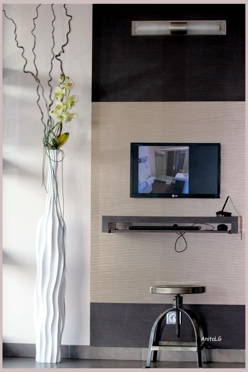 Télévision ou salle de divertissement dans l'établissement Forme-hotel & Spa Montpellier Sud-Est - Parc Expositions - Arena