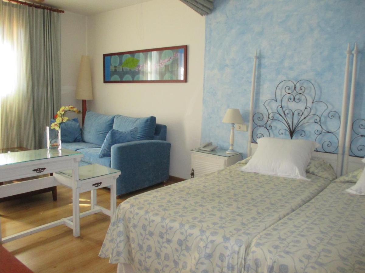Cama o camas de una habitación en Hotel Rosa & Spa Begur