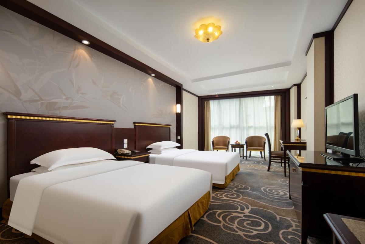 Gem Flower Hotel - North Bund - Housity