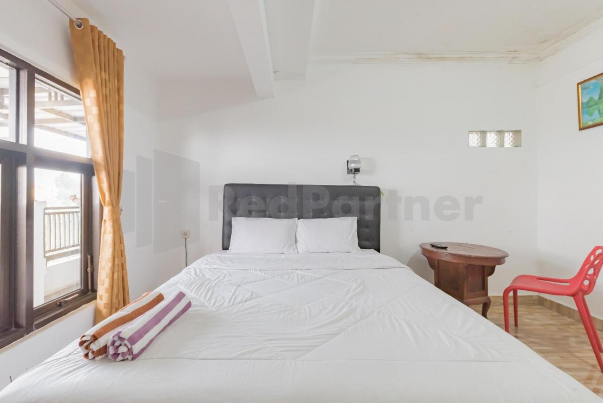 Arion 45 Losmen Cafe and Resto RedPartner - Housity