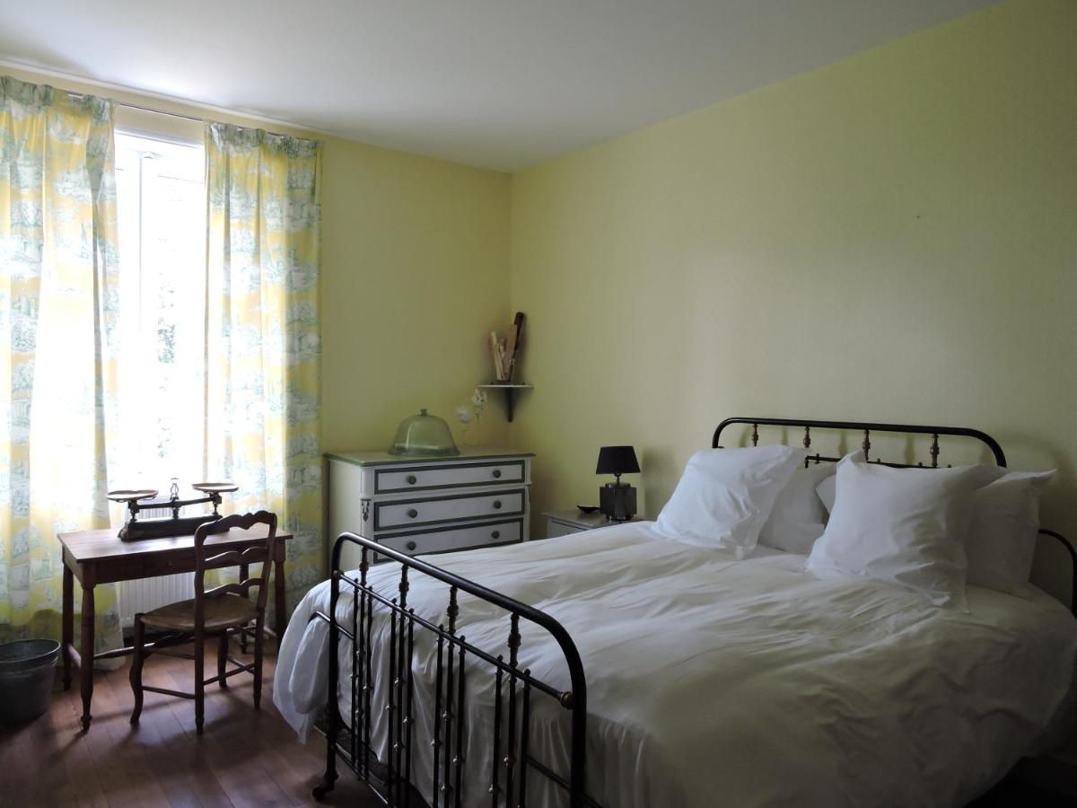 Un ou plusieurs lits dans un hébergement de l'établissement Le Domaine de Mestré, The Originals Relais