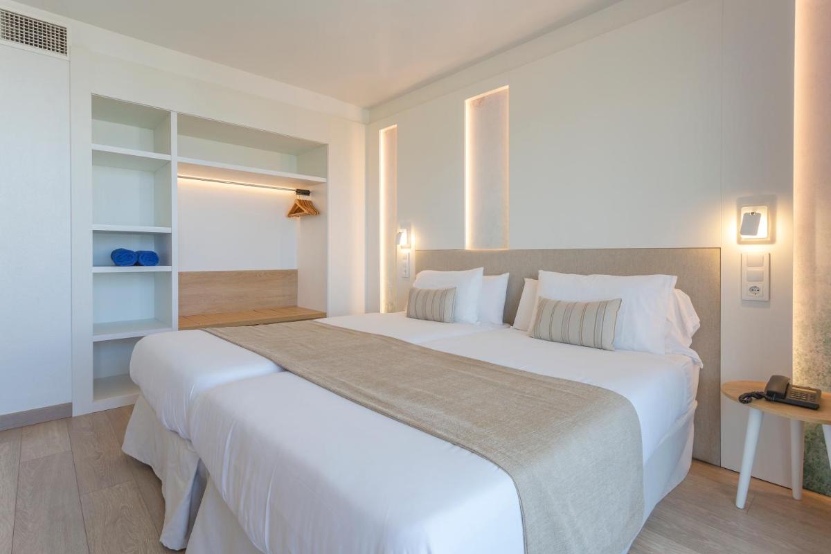 Cama o camas de una habitación en Marins Playa