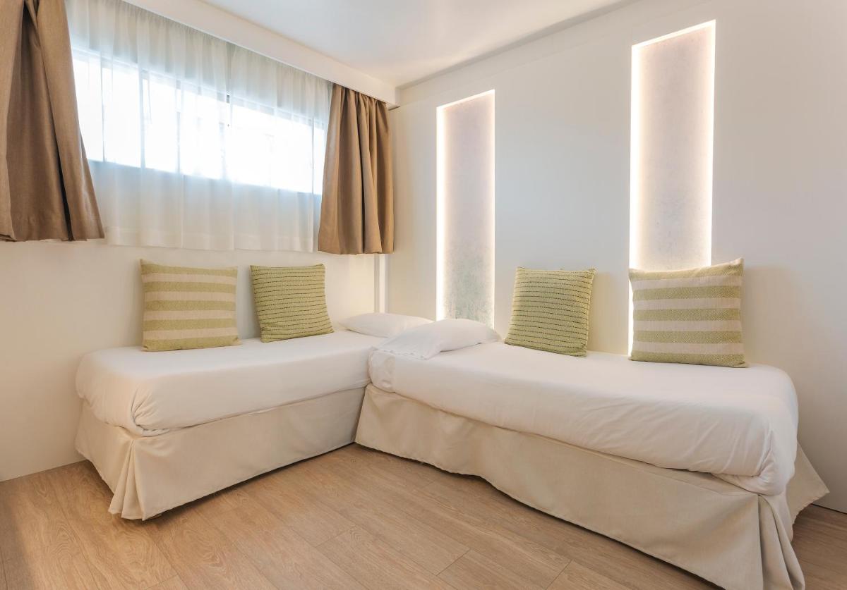 Cama o camas de una habitación en Marins Playa