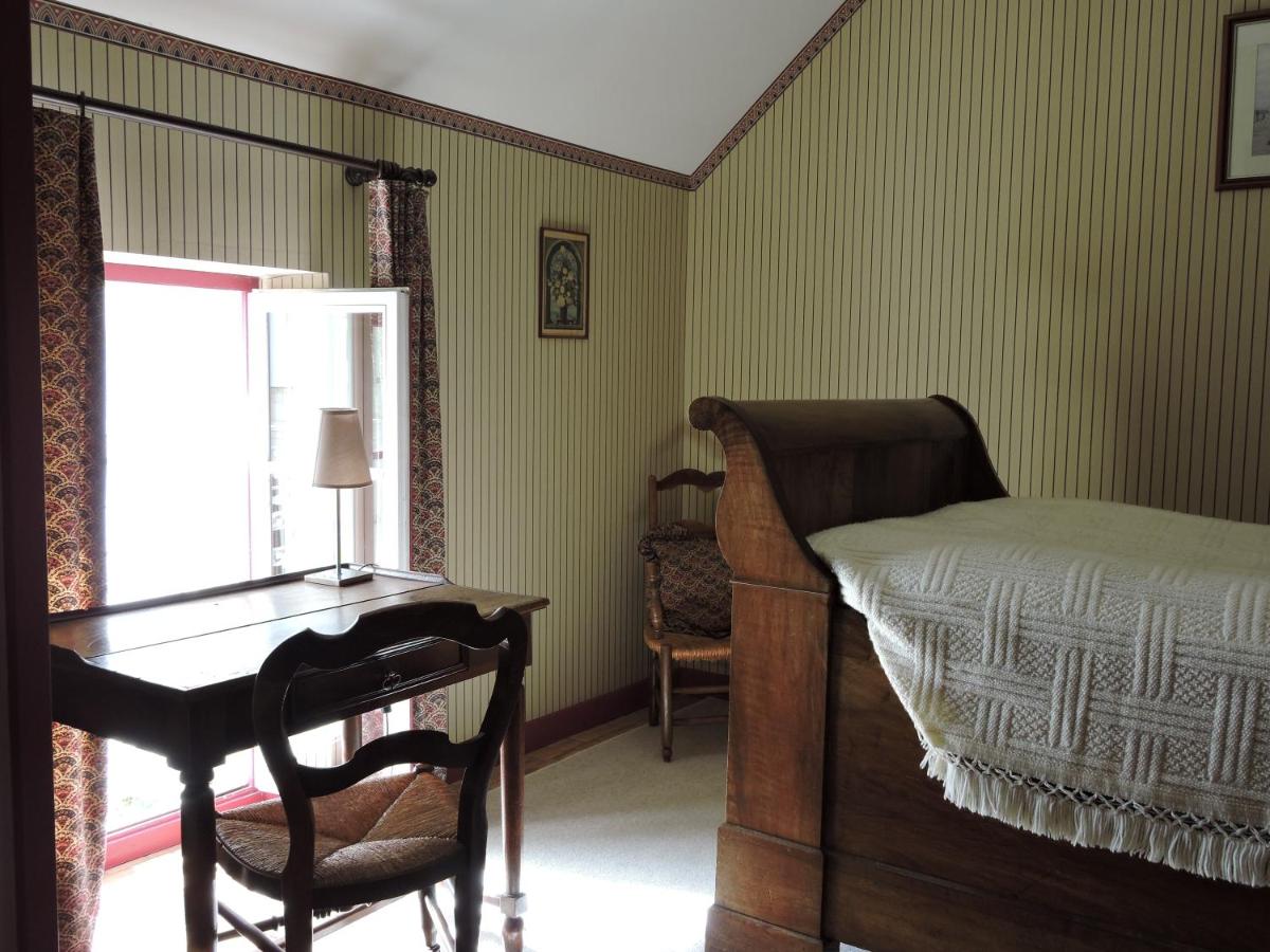 Un ou plusieurs lits dans un hébergement de l'établissement Le Domaine de Mestré, The Originals Relais