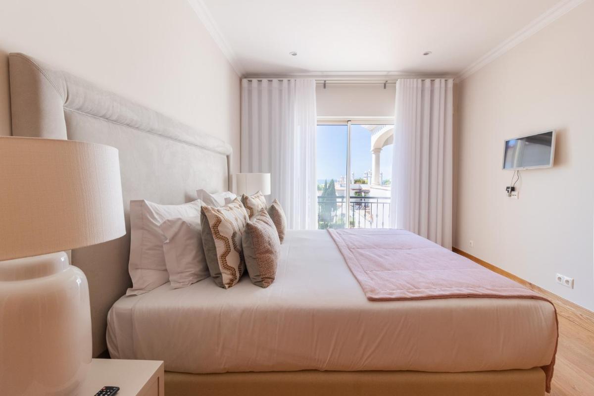 Uma cama ou camas num quarto em Dunas Douradas Beach Club