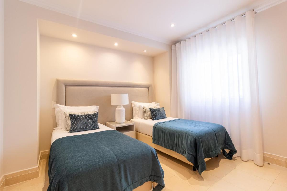 Uma cama ou camas num quarto em Dunas Douradas Beach Club