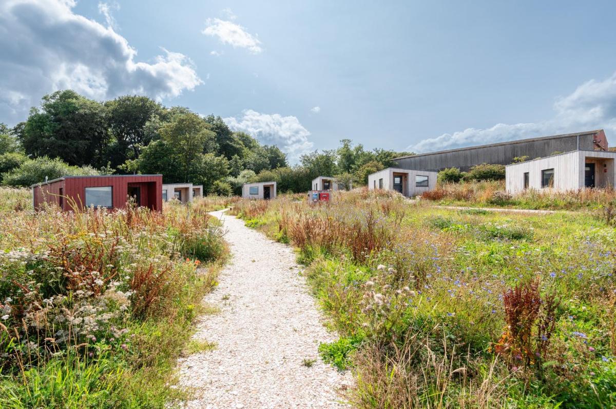 Rustic Cabins, sea views from rewilded farm - Housity
