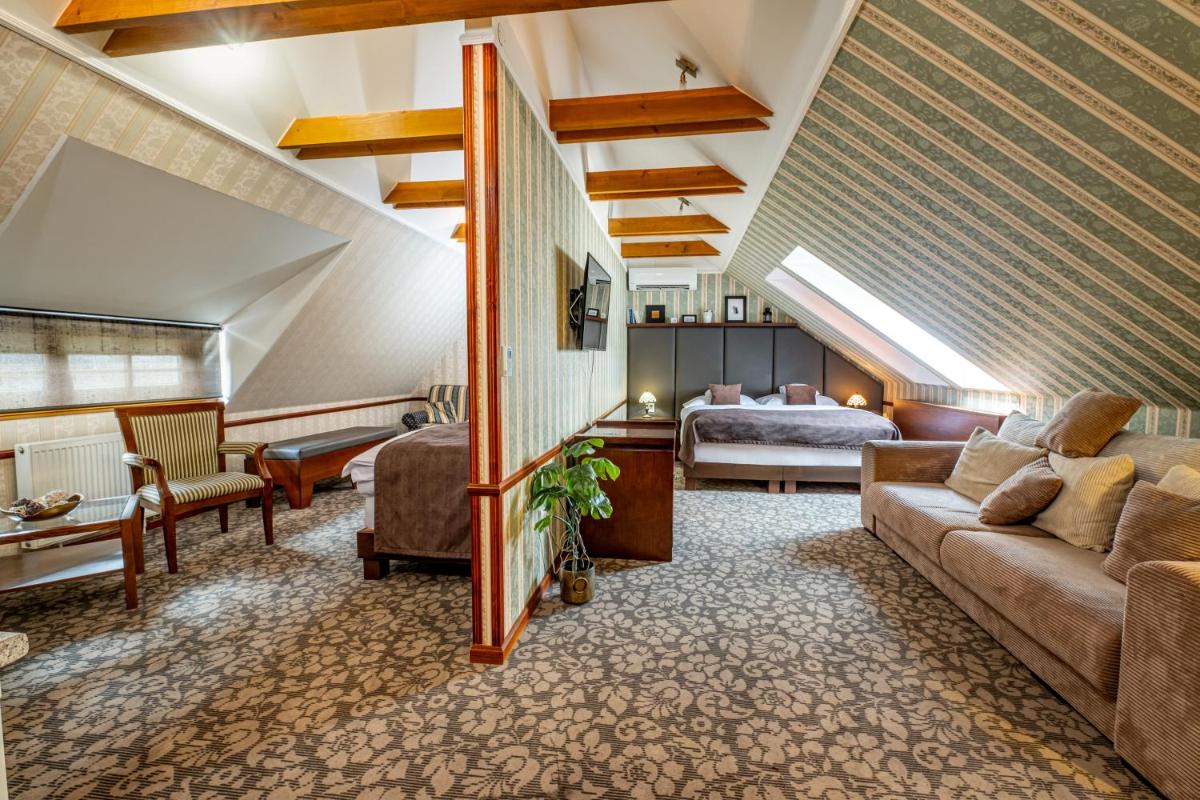 Hotel Golden Eagle - Housity