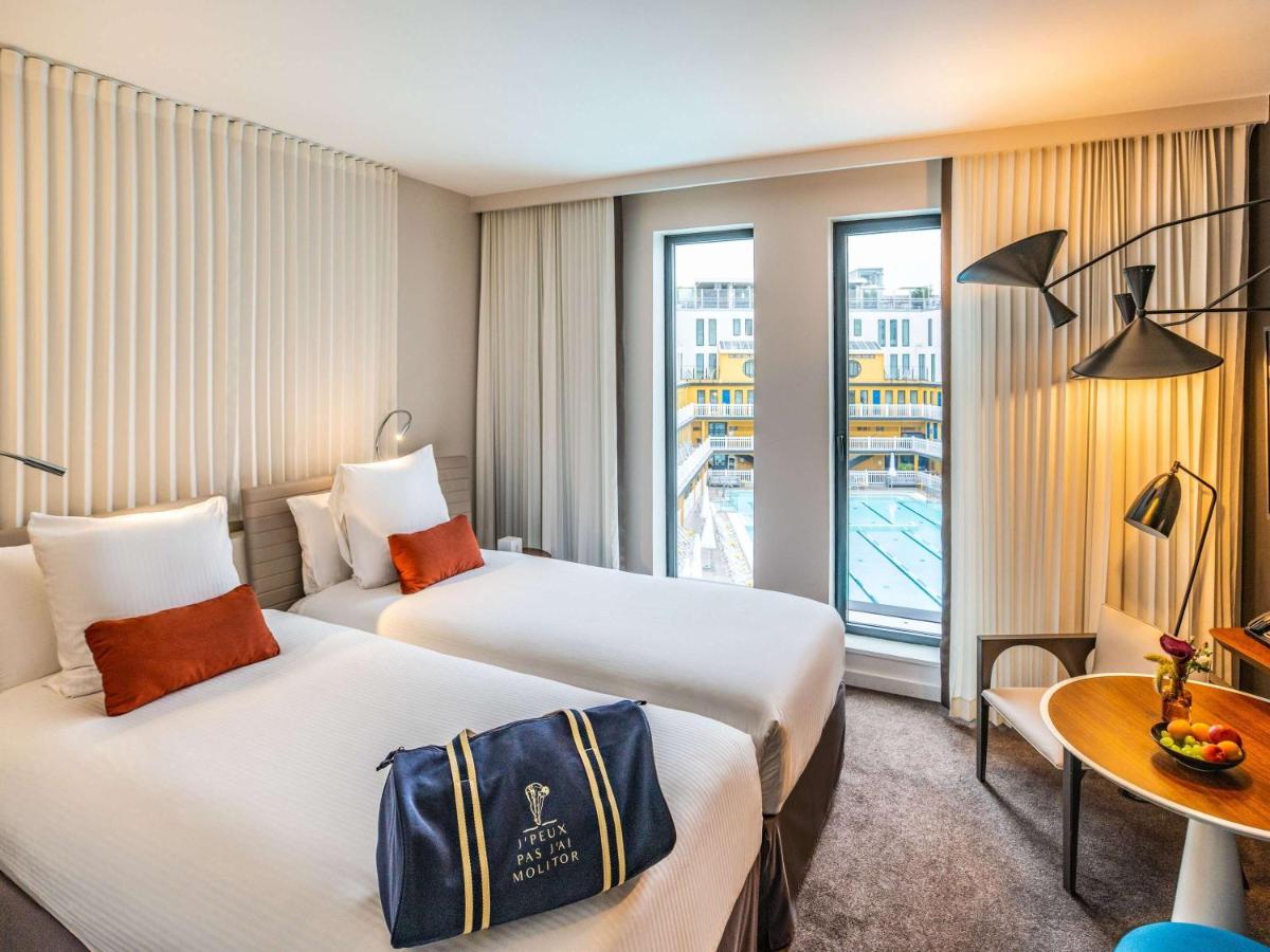 Un ou plusieurs lits dans un hébergement de l'établissement Molitor Hotel & Spa Paris - MGallery Collection