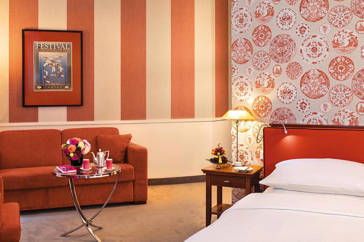 Ein Bett oder Betten in einem Zimmer der Unterkunft Hotel Goliath am Dom