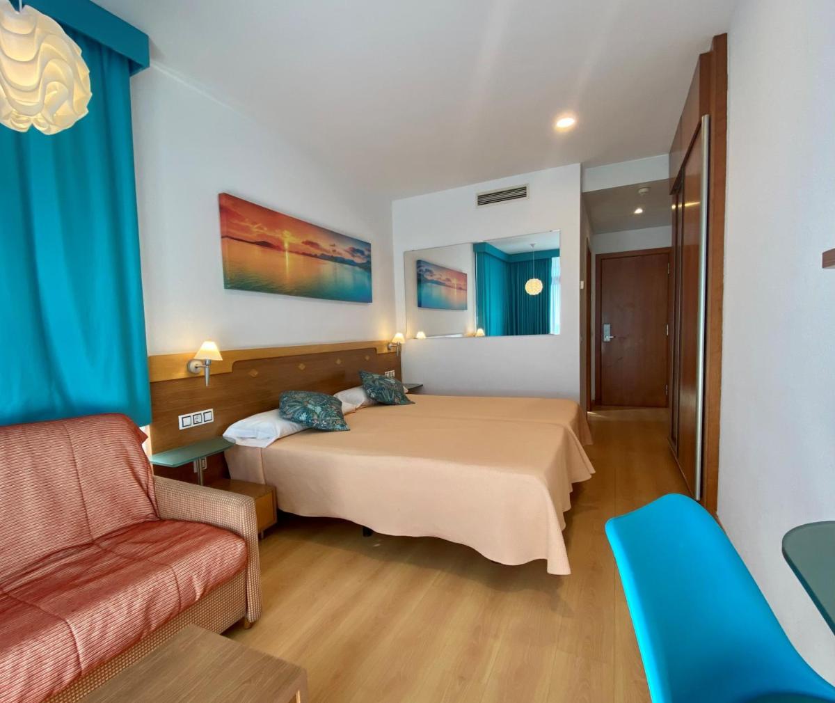 Cama o camas de una habitación en Hotel Blaucel