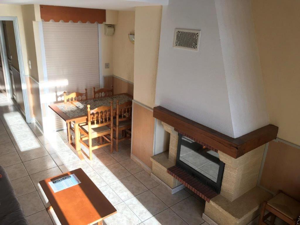 Coin salon dans l'établissement Hotel et Résidence Le Clos Cerdan