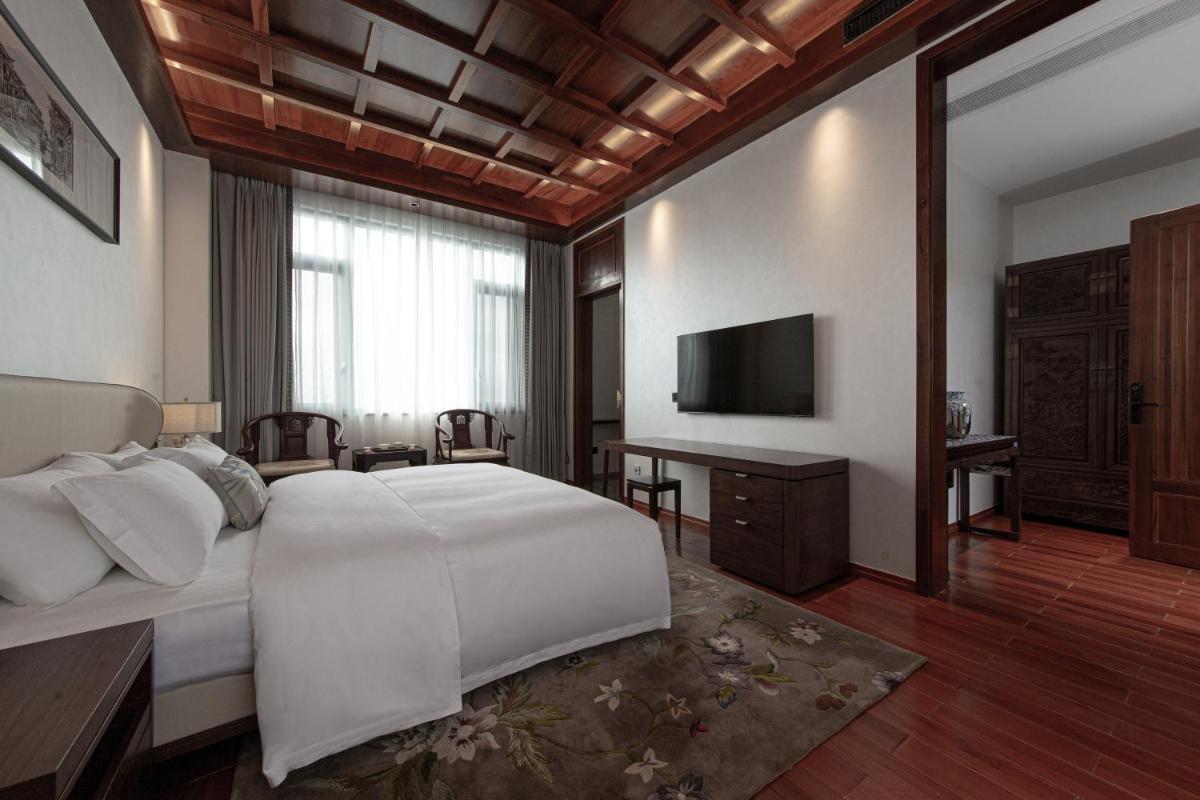 Suitetrails - Lijiang Heting Nakhi Boutique Hotel - Lijiang Ancient Town