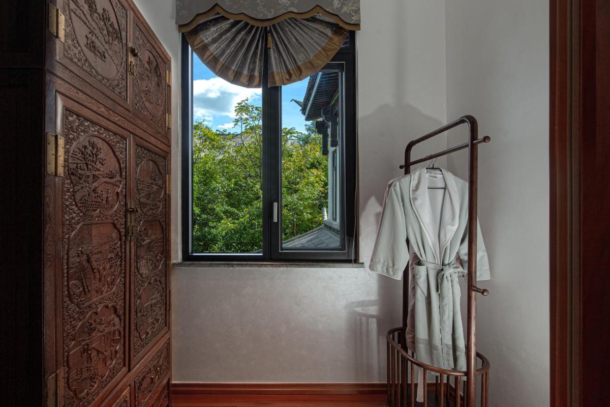Suitetrails - Lijiang Heting Nakhi Boutique Hotel - Lijiang Ancient Town