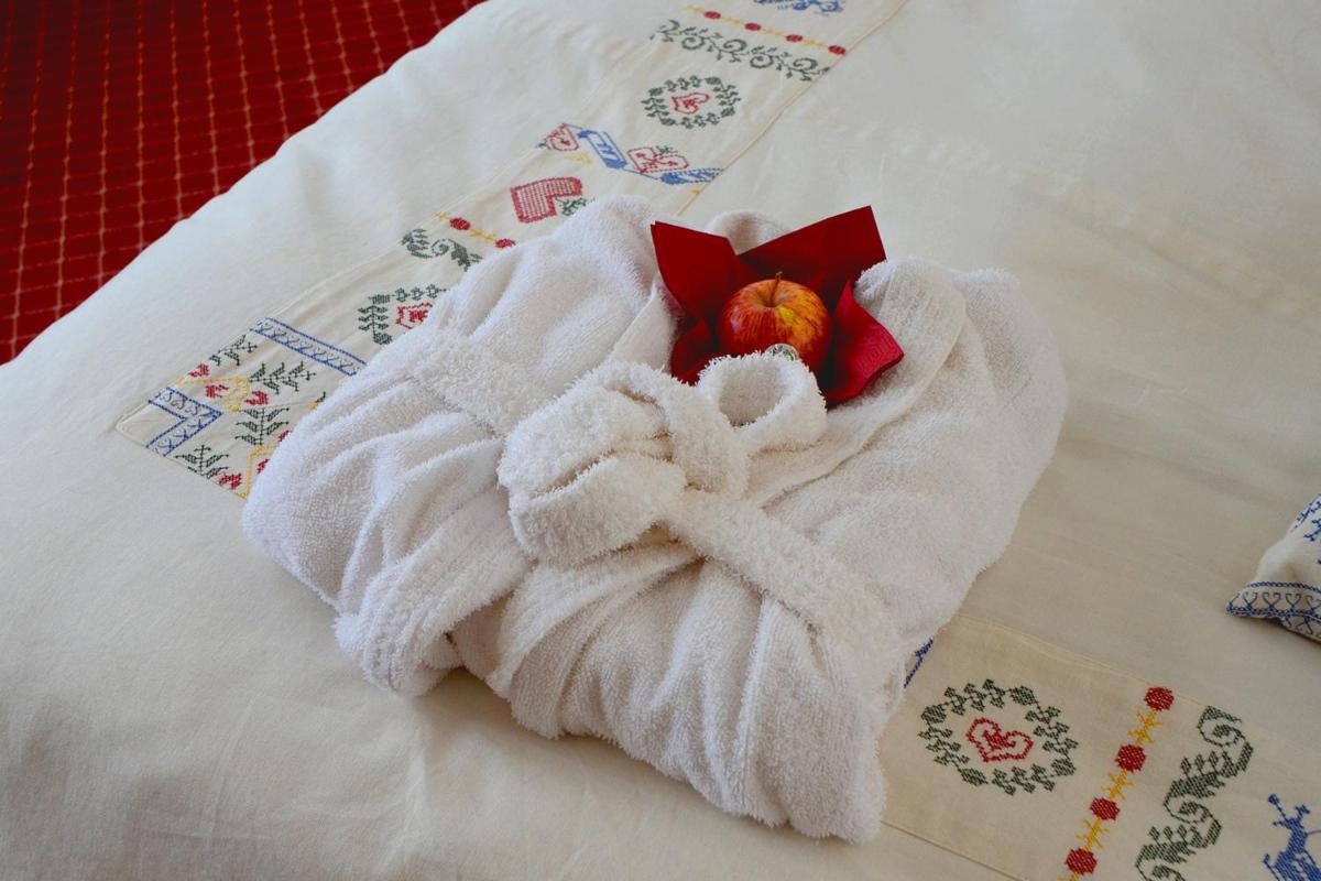 Ein Bett oder Betten in einem Zimmer der Unterkunft Wellness und Romantik Hotel Helmboldt