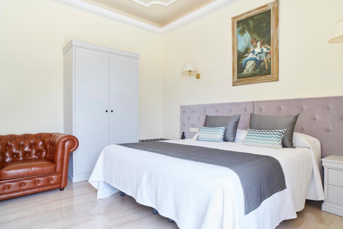 Cama o camas de una habitación en Grand Hotel Palladium Santa Eulalia del Río