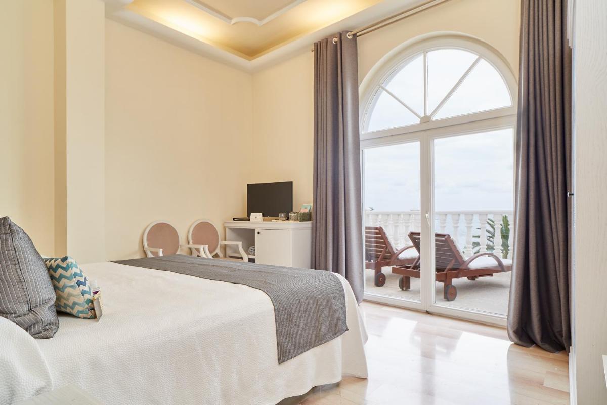 Cama o camas de una habitación en Grand Hotel Palladium Santa Eulalia del Río