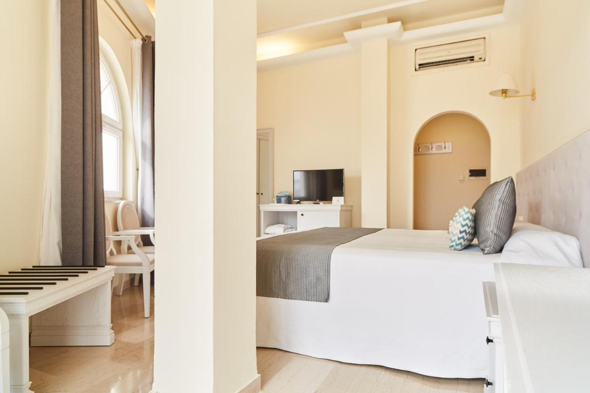 Cama o camas de una habitación en Grand Hotel Palladium Santa Eulalia del Río