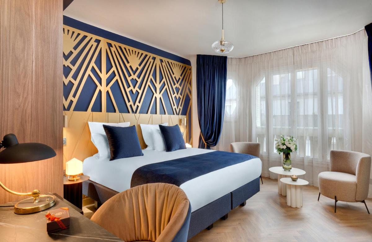 Un ou plusieurs lits dans un hébergement de l'établissement Hôtel Artemisia Montmartre