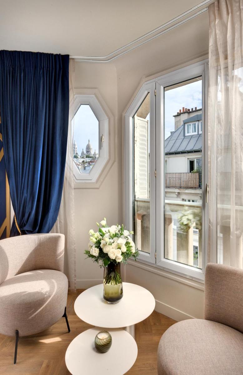 Coin salon dans l'établissement Hôtel Artemisia Montmartre