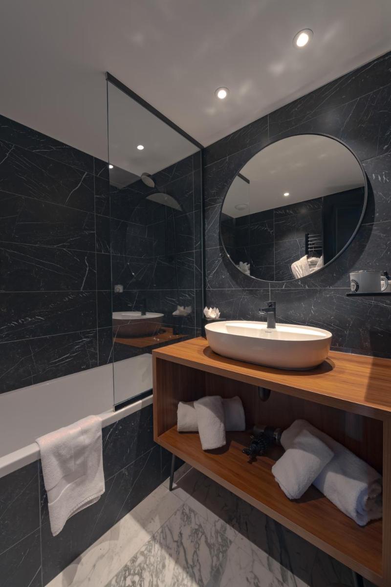 Salle de bains dans l'établissement Fahrenheit Seven Courchevel
