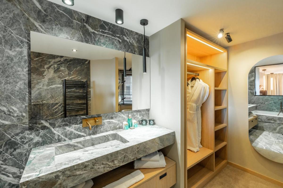 Salle de bains dans l'établissement Fahrenheit Seven Courchevel