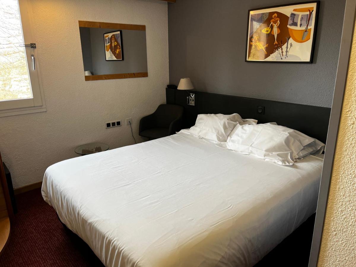 Un ou plusieurs lits dans un hébergement de l'établissement Sure Hotel by Best Western Annecy
