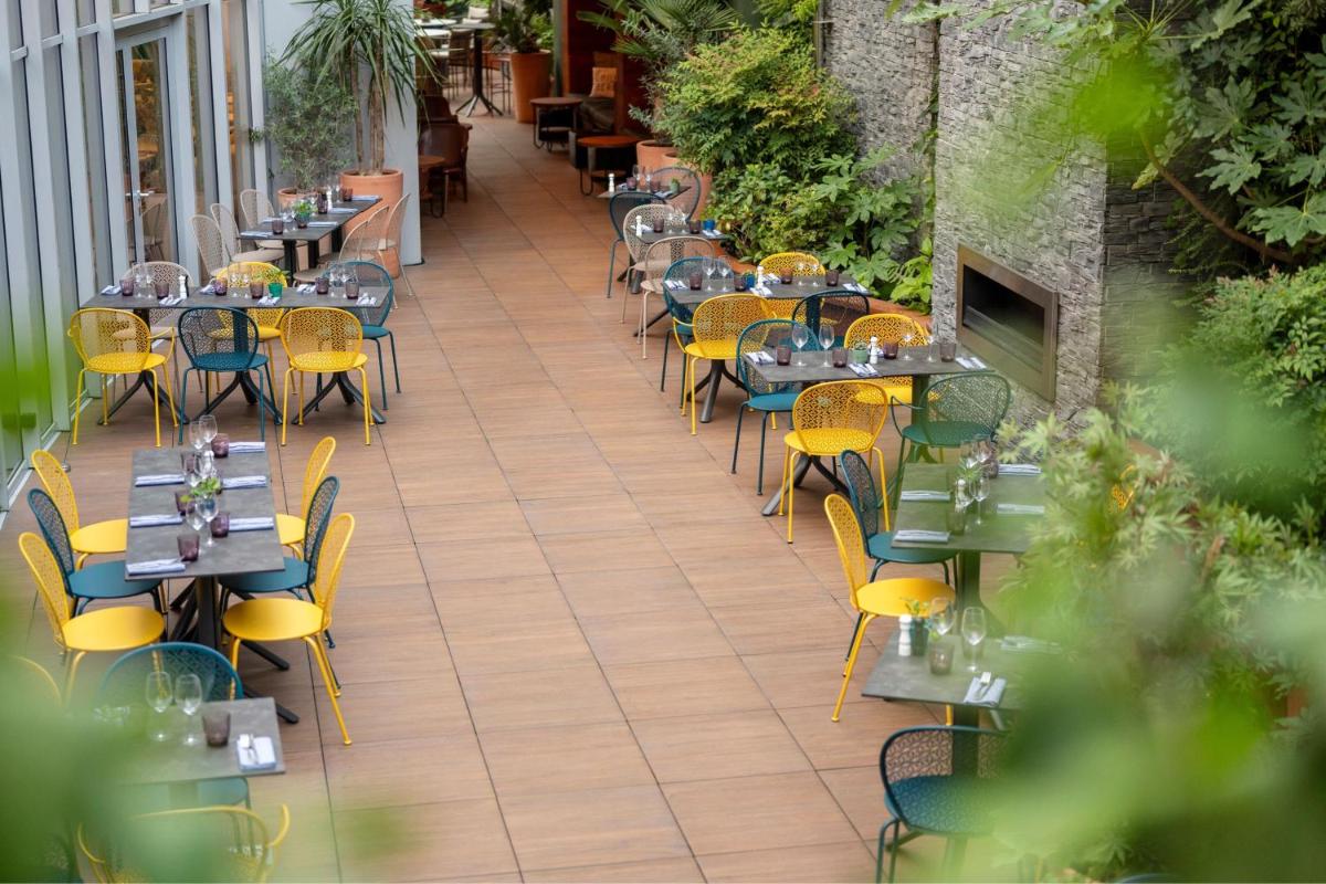 Restaurant ou autre lieu de restauration dans l'établissement Renaissance Paris Republique Hotel & Spa