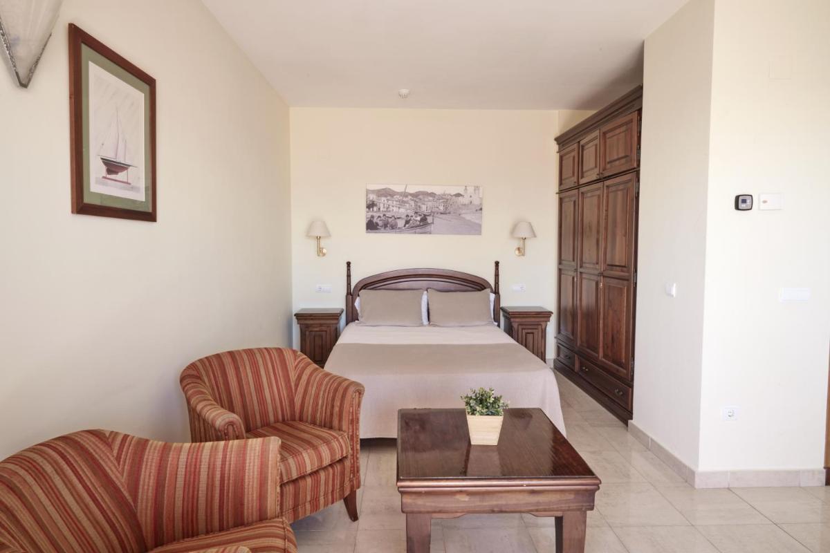 Cama o camas de una habitación en Sunway Playa Golf & Spa Sitges