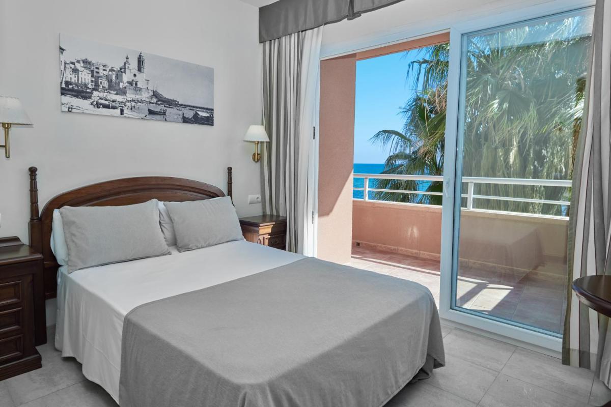 Cama o camas de una habitación en Sunway Playa Golf & Spa Sitges