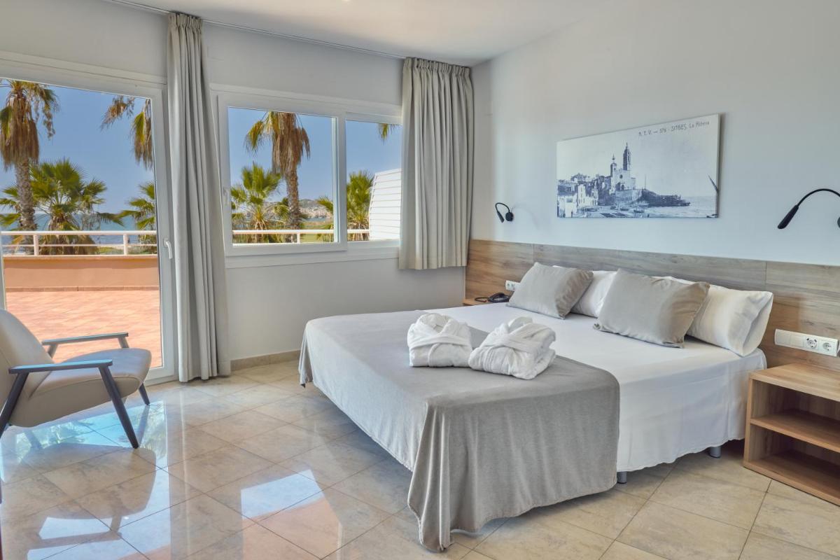 Cama o camas de una habitación en Sunway Playa Golf & Spa Sitges