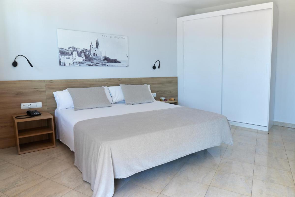 Cama o camas de una habitación en Sunway Playa Golf & Spa Sitges