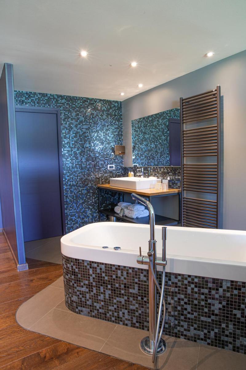 Salle de bains dans l'établissement Le Petit Létraz