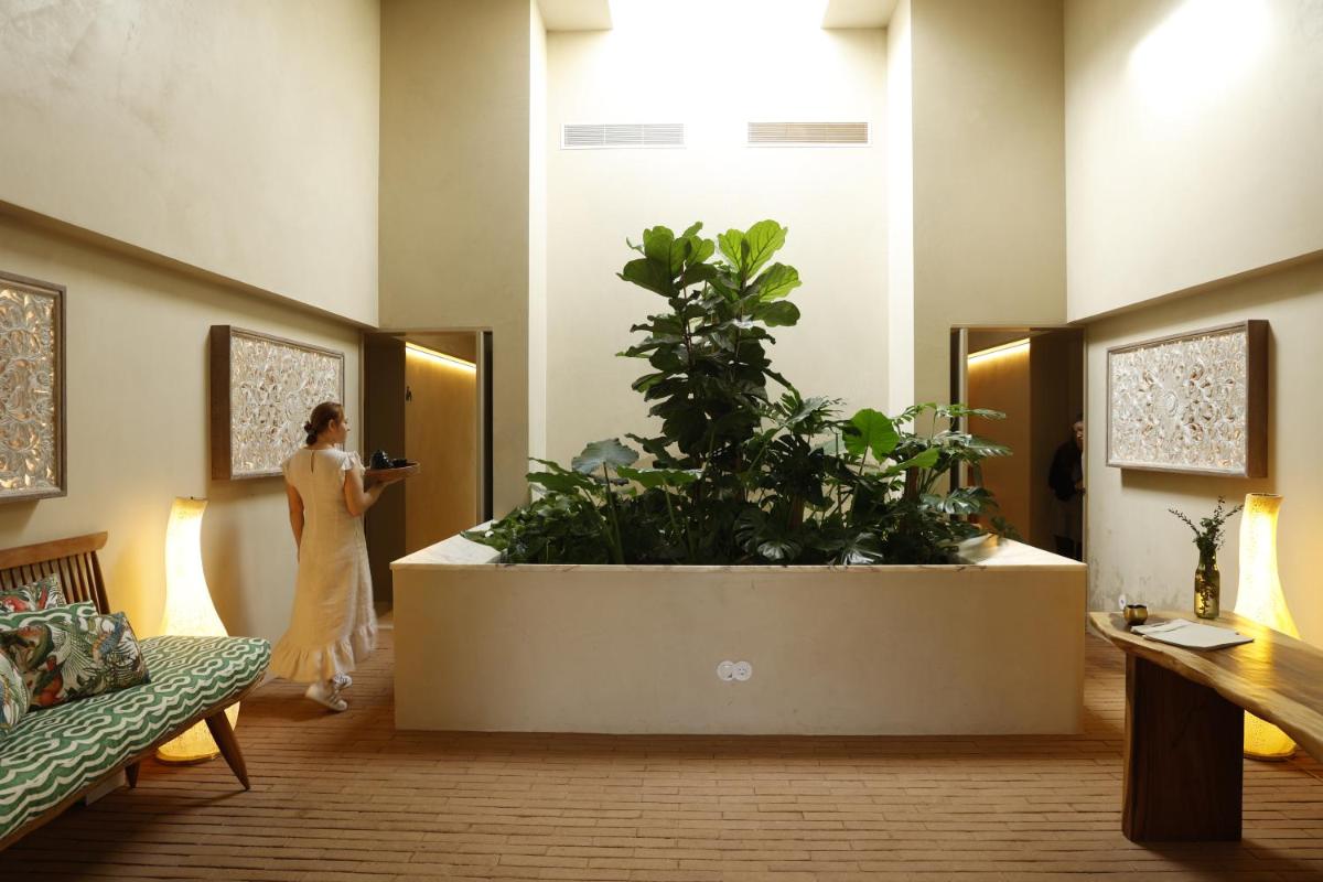 Uma área de estar em Praia do Canal Nature Retreat - Small Luxury Hotels of the World