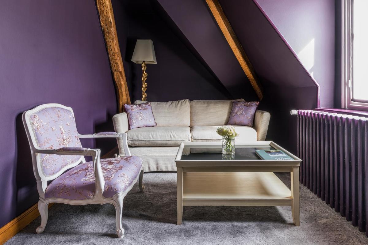 Coin salon dans l'établissement Les Hauts de Loire Relais & Châteaux