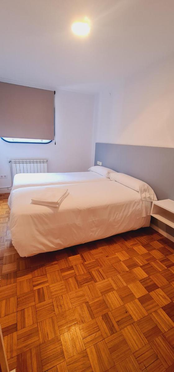 Cama o camas de una habitación en Estación de Montaña Manzaneda