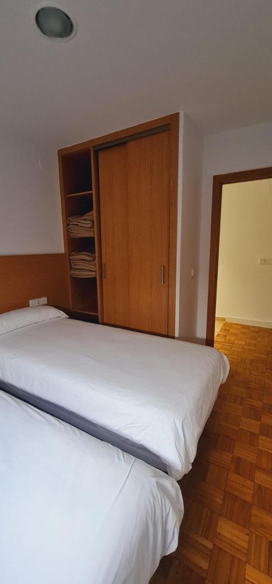 Cama o camas de una habitación en Estación de Montaña Manzaneda