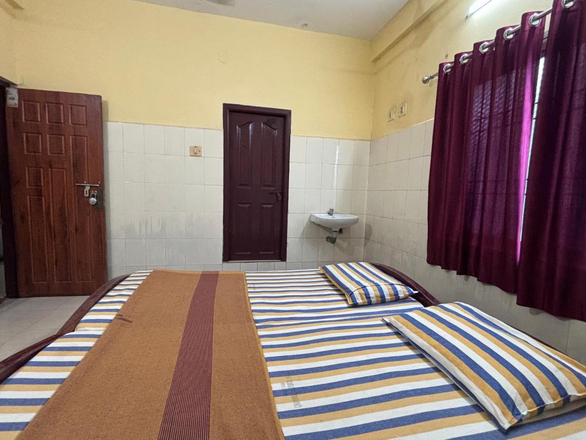 Chinmayi Tourist Home - Opposite to temple only 50 m - Housity