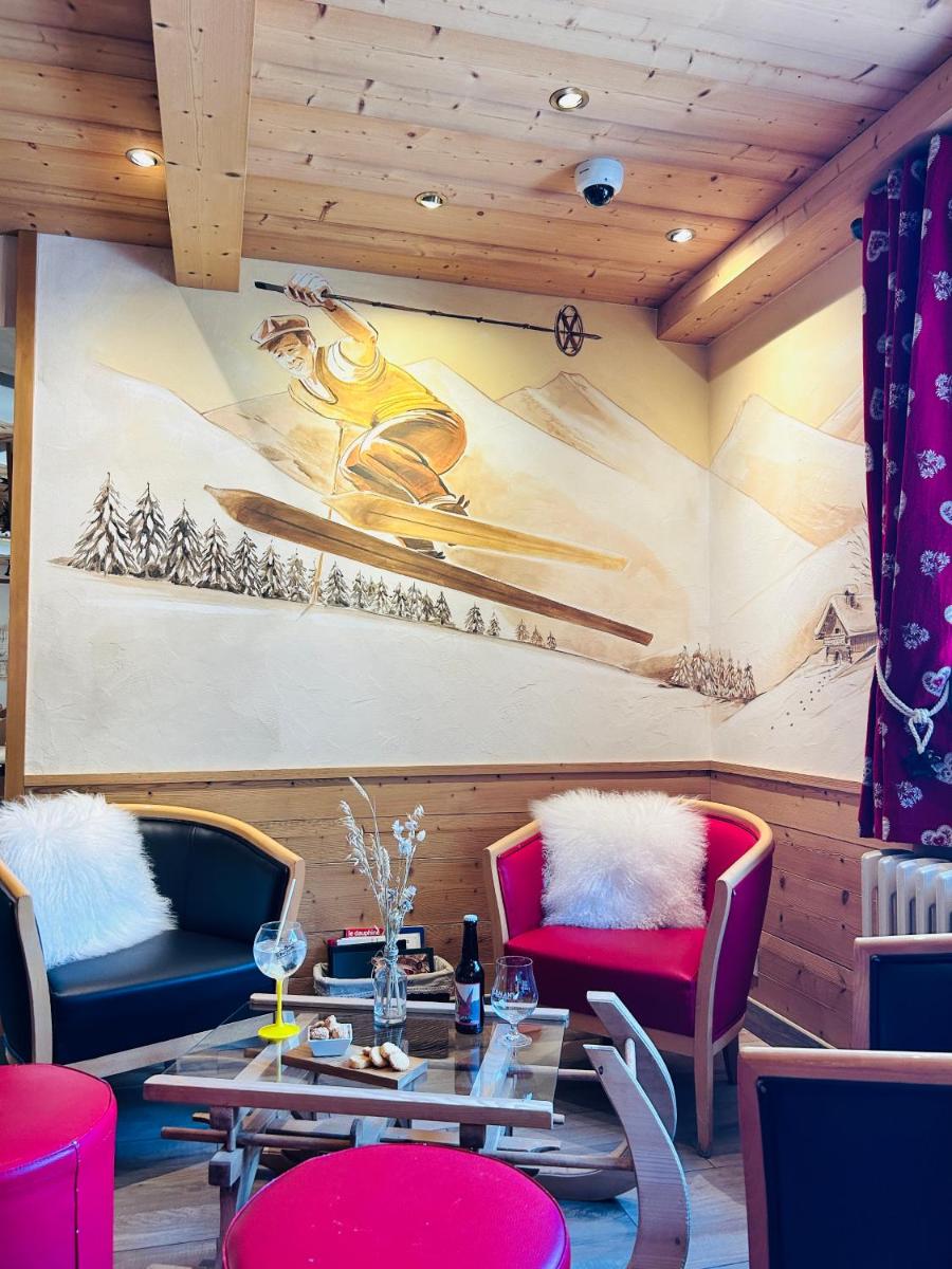 Coin salon dans l'établissement Hameau des Prodains - Hôtel