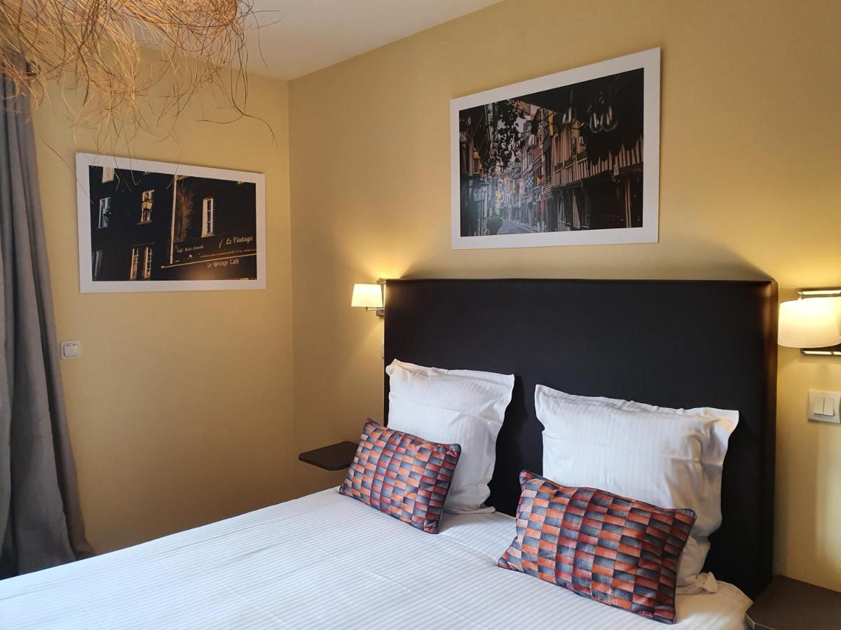 Un ou plusieurs lits dans un hébergement de l'établissement La Fraîchette-Hôtel & Spa