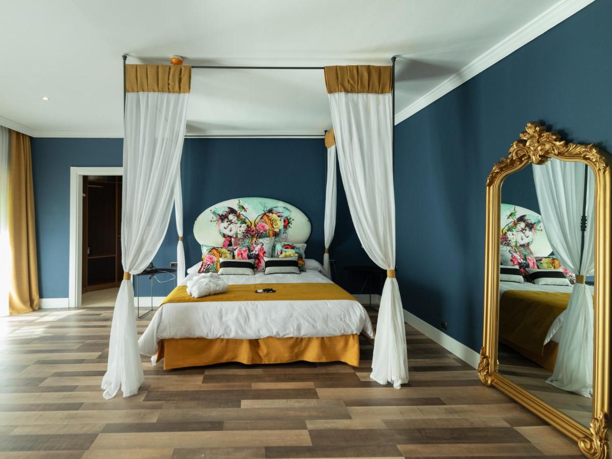Cama o camas de una habitación en Hotel Altos de Istán