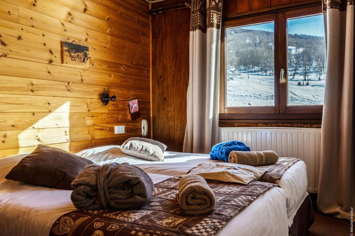Un ou plusieurs lits dans un hébergement de l'établissement Hotel Spa L'Equipe