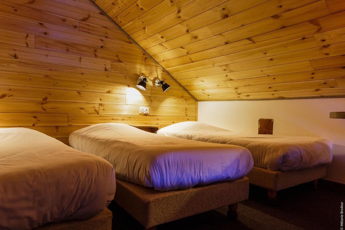 Un ou plusieurs lits dans un hébergement de l'établissement Hotel Spa L'Equipe