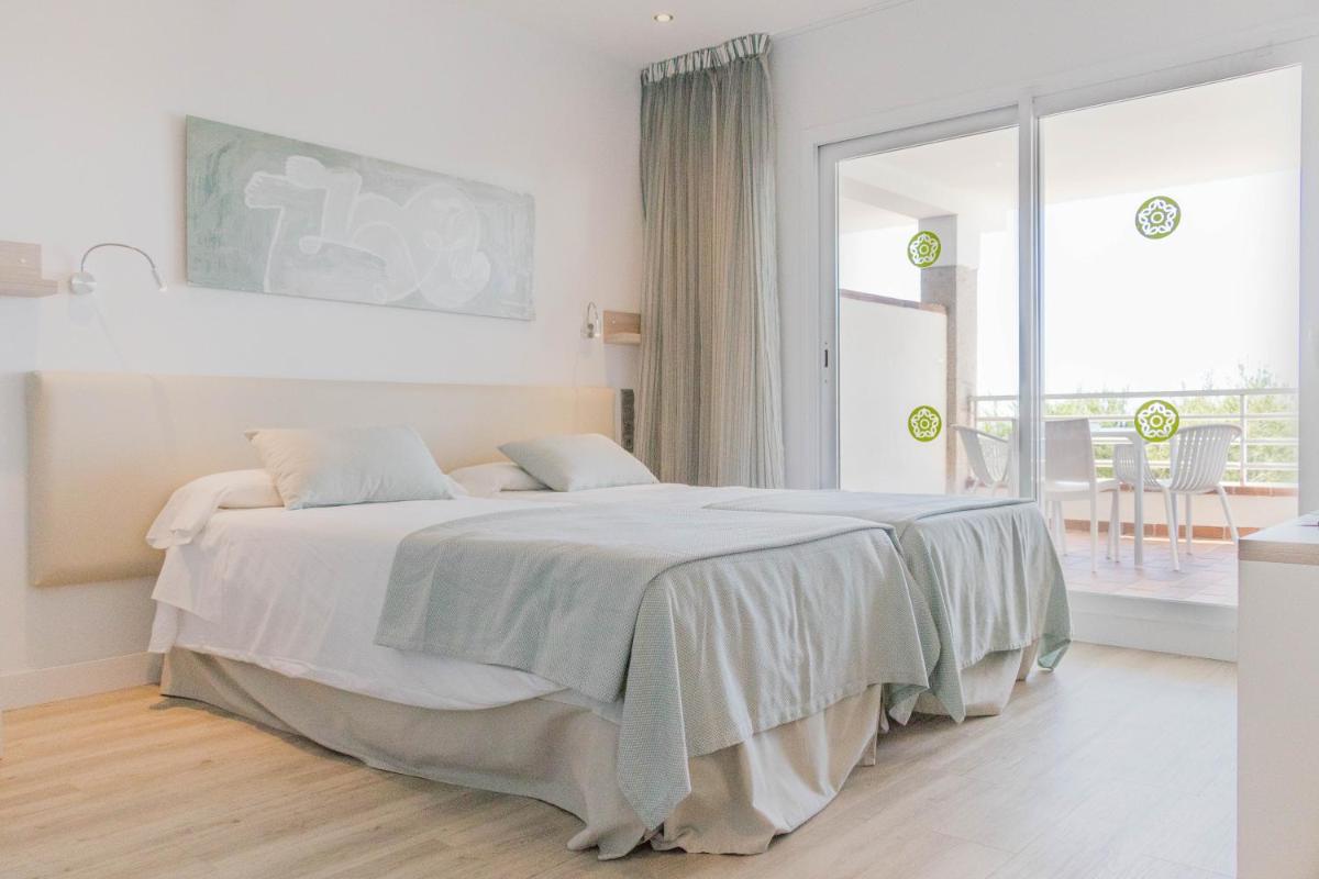 Cama o camas de una habitación en Houm Plaza Son Rigo