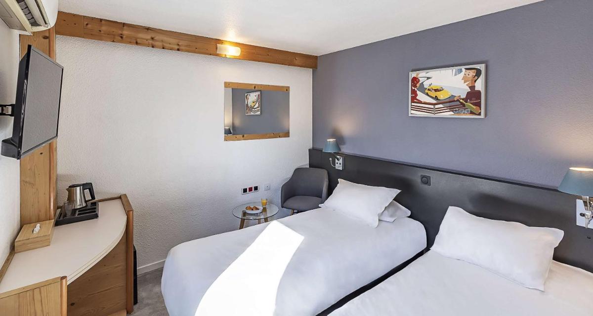 Un ou plusieurs lits dans un hébergement de l'établissement Sure Hotel by Best Western Annecy